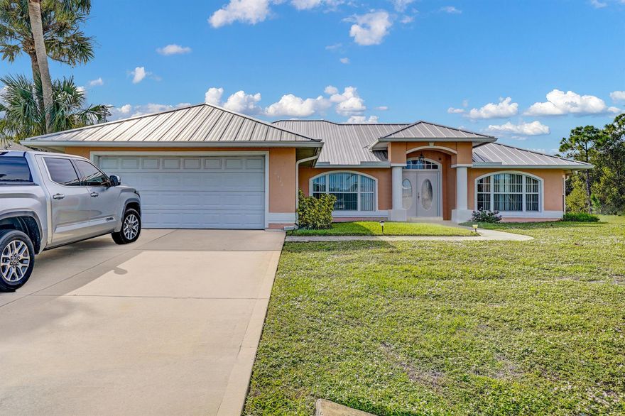 This property has it all! Waterfront home with 3 Beds, 2 Baths, a swimming pool and your very own dock. NO HOA! Gorgeous custom built home with plank flooring, vaulted ceiling and spacious bedrooms and bathrooms. Kitchen features white cabinetry, granite counters and a flexible area that could be an in eat kitchen, office or family room. Experience privacy with no rear neighbors and enjoy the scenic views of the water, lush landscaping and pool. Screened in pool offers plenty of space for lounge chairs and a covered area perfect for an outdoor living or dining area. Enjoy fishing with the convenience of your own dock along the canal. Peace of mind with a newer metal roof.