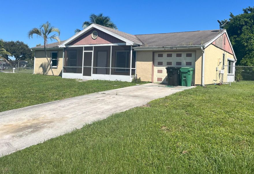 Embrace the charm of this welcoming 4-bedroom, 2-bathroom home nestled on a spacious corner lot. The garage has been converted to a 4th bedroom. Enjoy the fenced in back yard, perfect for pets. Conveniently located in the heart of Port St Lucie, this home offers seamless access to 95 and the Turnpike as well as shopping centers, entertainment venues, banks and restaurants.