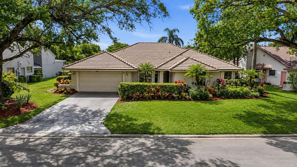 Photo of 5055 NW 89TH Way, Coral Springs, FL 33067 (MLS # B26064007)