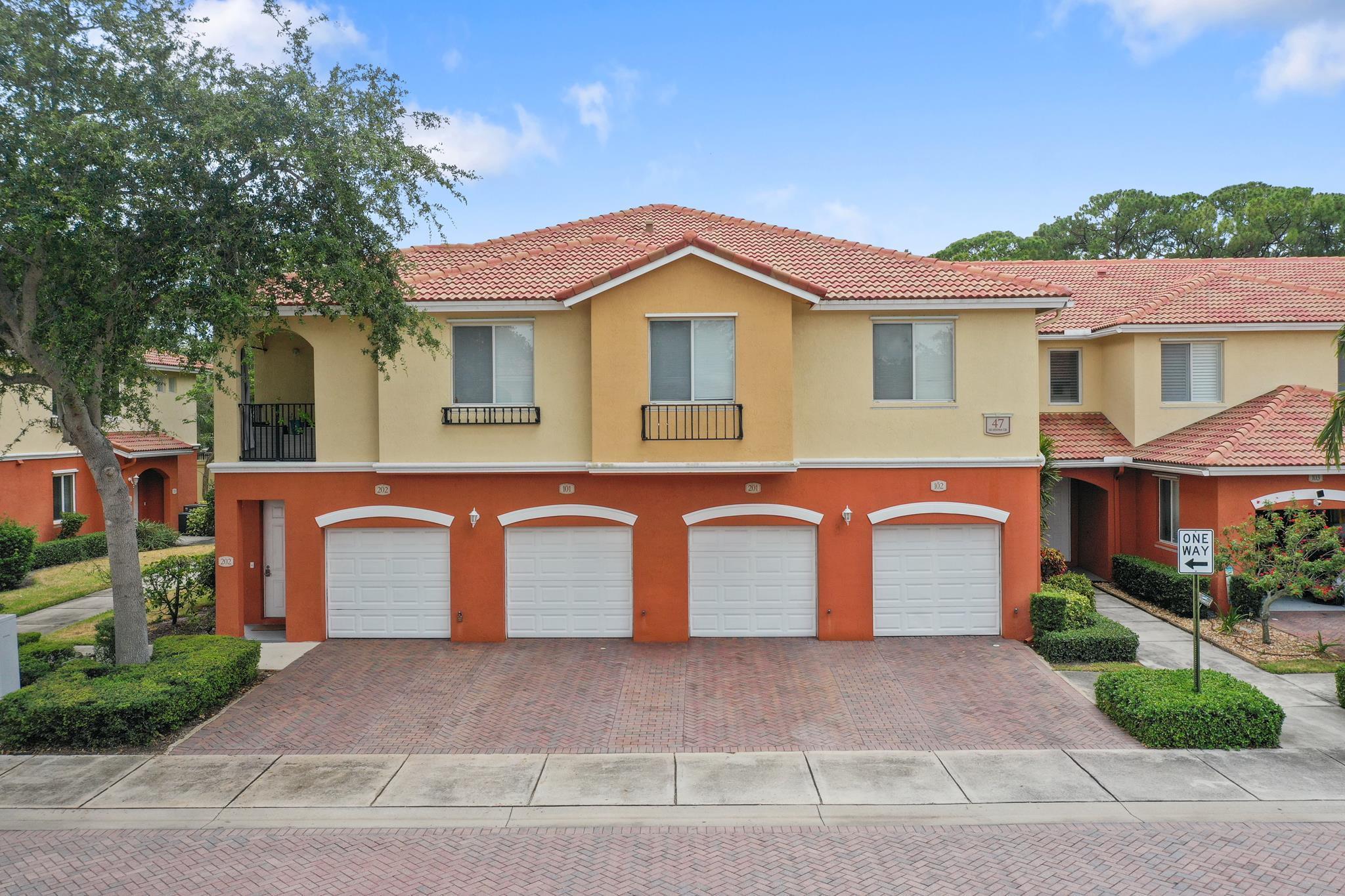 LOCATION, LOCATION, LOCATION! Amazing second floor corner unit, 3 bedroom 2 bath condo with attached 1 car garage in the prestigious gated neighborhood of Vilabella in the heart of Stuart. This immaculate unit features upgrades galore: all hurricane impact windows and slider, new Whirlpool stainless steel kitchen appliances, white kitchen cabinets, granite countertops, new Whirlpool washer and dryer, tile floors throughout, new premium carpeting in all bedrooms, new hot water tank, newer AC, Nest smart home devices, LED lights throughout, all freshly painted, new cordless blinds, new ceiling fans and dining room and kitchen light fixtures.. This is a rare gem in one of the best locations in Martin County, minutes from downtown Stuart, restaurants, shopping, golf and Treasure Coast beaches