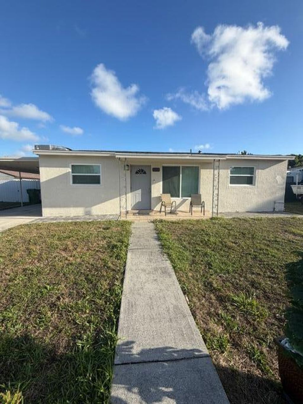 Photo of 320 Winged Foot Road, Palm Springs, FL 33461 (MLS # B26001885)