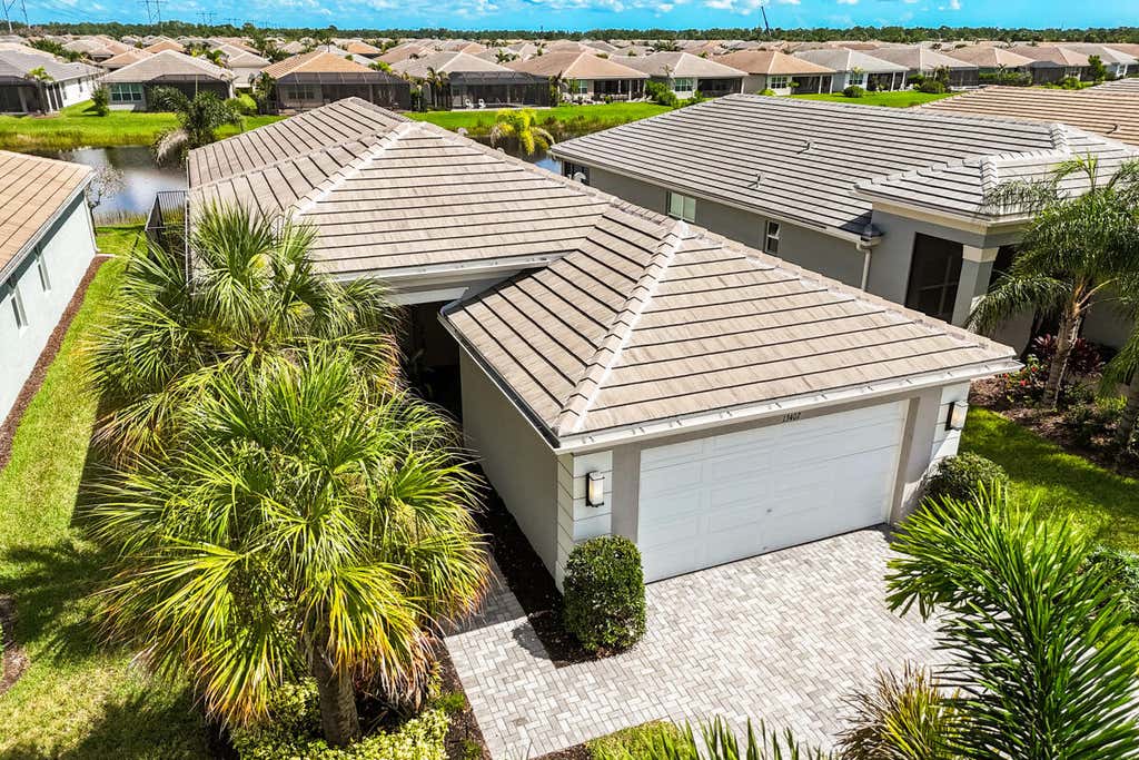 Photo of 13407 SW River Rock Road, Port Saint Lucie, FL 34987 (MLS # B26063615)