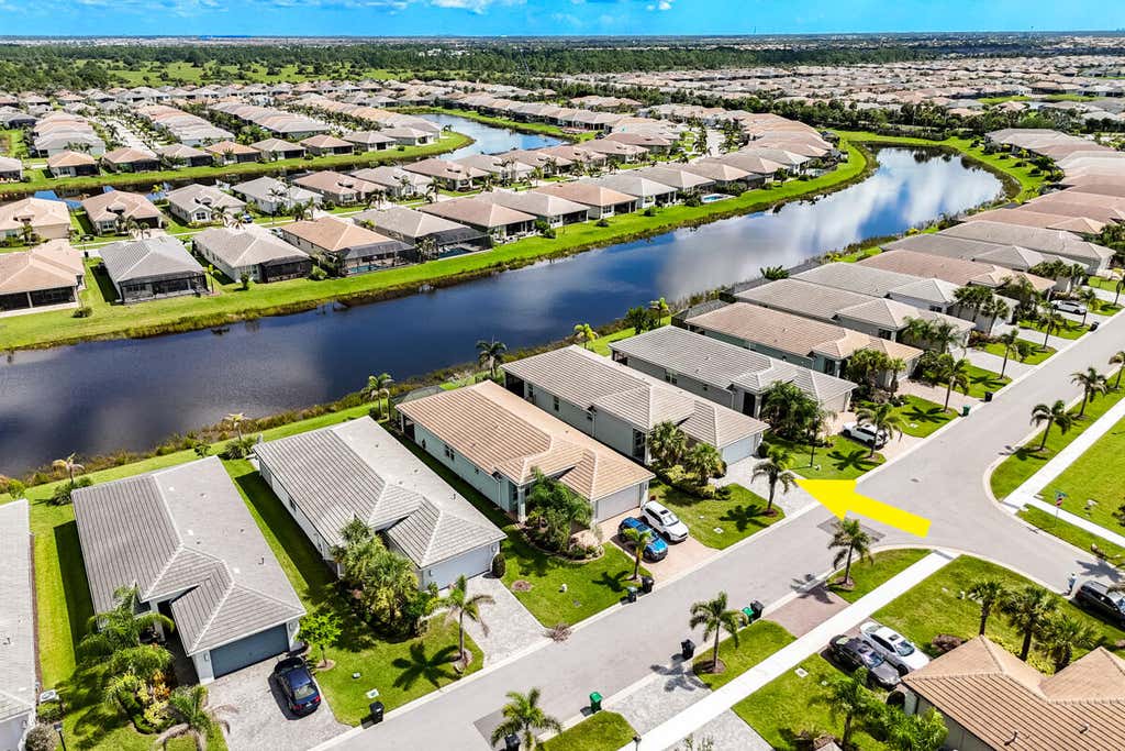 Photo of 13407 SW River Rock Road, Port Saint Lucie, FL 34987 (MLS # B26063615)