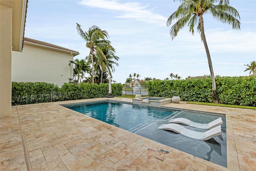 Welcome to luxury living at its finest! This exquisite 5-bedroom with a den, 4 1/2-bathroom GL home is a masterpiece of design and comfort. As you step inside, you are greeted by the elegance of marble floors that seamlessly flow through the main living areas, creating a timeless and luxurious ambiance. With the master bedroom conveniently located on the ground floor. Upstairs, the wood floors add warmth and charm to the four additional bedrooms, creating a harmonious balance of sophistication and coziness.Step outside to discover the brand-new outdoor kitchen, providing a delightful space for al fresco dining and entertaining guests. The meticulously crafted pool and pool deck invite you to relax and unwind in style, creating your own private oasis.