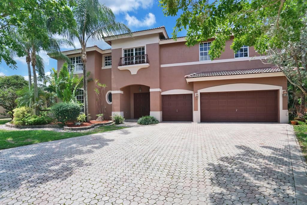 Photo of 402 NW 118th Terrace, Coral Springs, FL 33071 (MLS # R10714000)