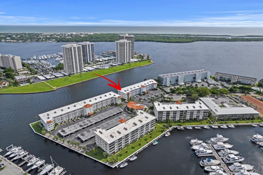 ABSOLUTELY GORGEOUS WATERFRONT CONDO | PRESTIGIOUS 55+ COMMUNITY PORTS O'CALL | BREATHTAKING INTRACOASTAL VIEWS | NEW 2025 ROOF | Bright Open Floor Plan | Hardwood Floors | Crown Molding | Stunning Eat-In Kitchen | Breakfast Bar | Corian Counters | White Wood Cabinets | Pantry | Primary Bedroom w/ Walk-In Custom Closet | Ensuite | Tons of Storage | Large Screened Patio | Tropical Lush Manicured Landscaping | Washer & Dryer On Same Floor |  Assigned & Guest Parking | Resort-Like Amenities offer Heated Community Pool, Sun Deck, Game Room & Clubhouse | Prime Palm Beach Location, Minutes to Beaches, The Gardens Mall, Downtown West Palm Beach, Fine Dining, Shops, North Palm Beach Country Club & I-95 | Top A+ Rated Schools | AC 2023 | WH 2018 | PRESENT ALL OFFERS!