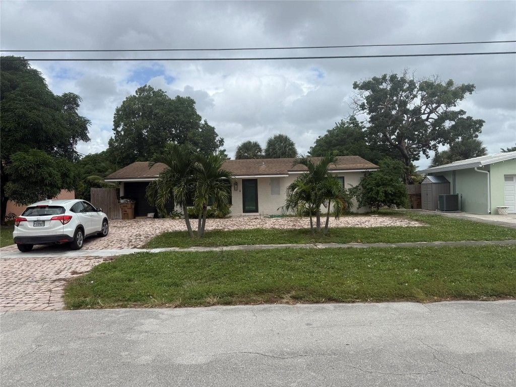 Photo of 521 NW 38th Place, Deerfield Beach, FL 33064 (MLS # F10533984)