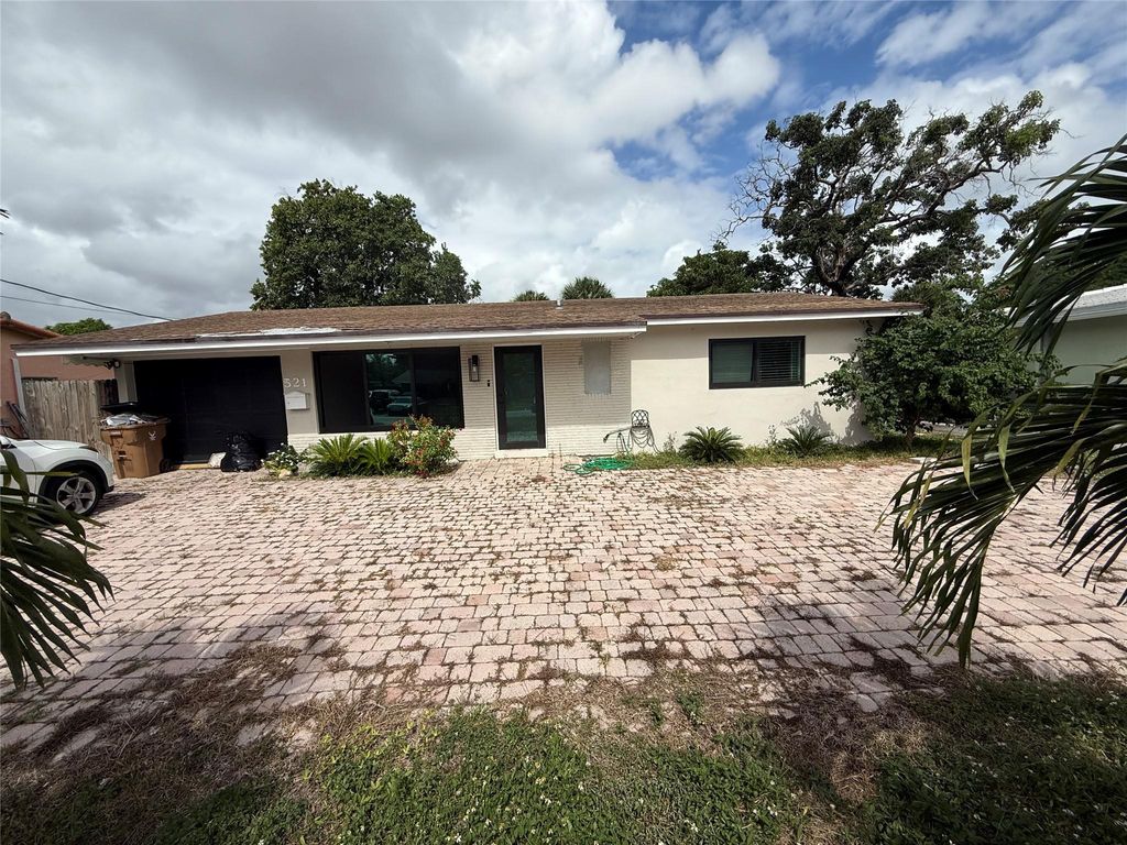 Photo of 521 NW 38th Pl, Deerfield Beach, FL 33064 (MLS # F10533984)