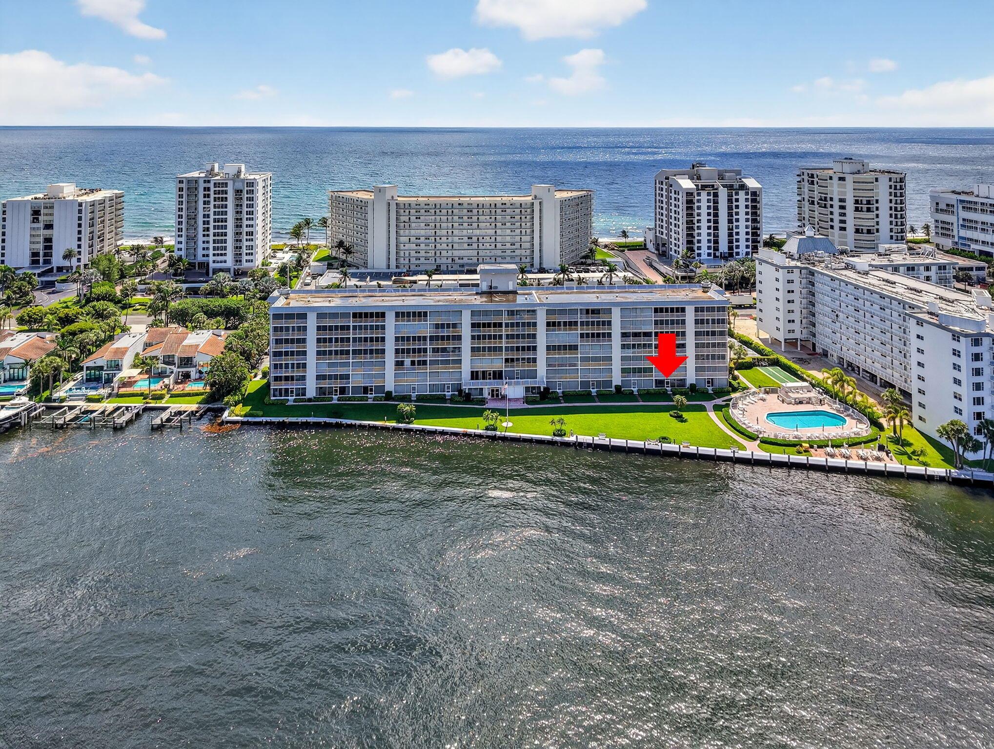Enjoy direct Intracoastal views and breathtaking sunsets from this rarely available first-floor unit in the heart of Highland Beach. This 2-bedroom, 2-bathroom residence features a spacious covered balcony perfect for relaxing or entertaining, with the water just steps away. Located right next to the pool, this unit also provides easy access to the community's private beach entrance directly across A1A -- giving you the best of both the Intracoastal and beachside lifestyle. The home is equipped with impact windows and accordion shutters for added storm protection. Inside, you'll find a bright layout ready for renovation and customization to create your dream coastal retreat. Community amenities include a clubroom, pool, gym, shuffleboard, BBQ, and private ocean access. A rare opportunity.