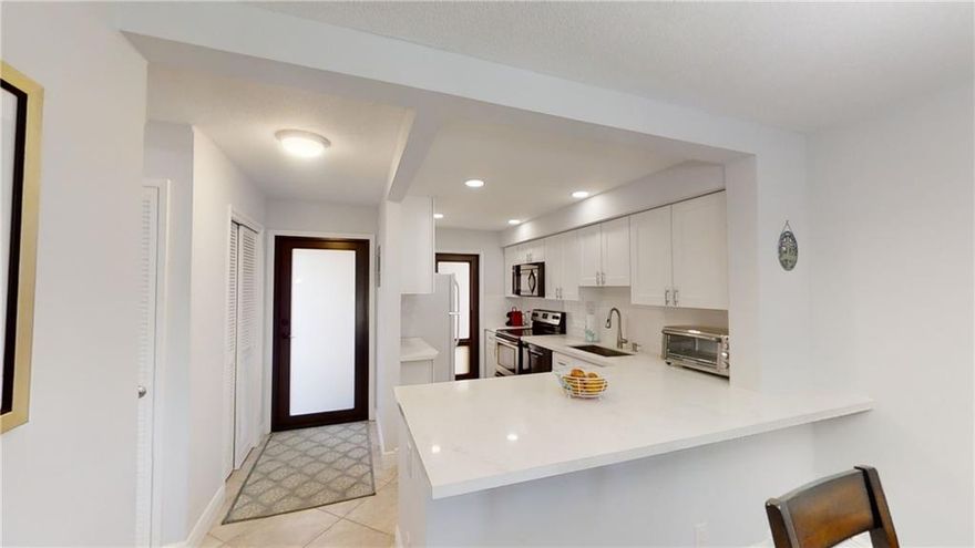 LOCATION! LOCATION! LOCATION! Come check out this charming turn key corner unit, all you need is your essentials! This spacious 2/2 newly renovated unit includes open concept kitchen, white quartz counters, with new shaker cabinets, newer appliances. All floors, bathroom sinks, including outside patio are redone. Impact windows throughout including doors & back slider. New furniture throughout goes great with the new paint and tile floors. Garden Aire Village is a 55 & older community and has it all: heated pool, community center w/ games, gym, locker rooms, BBQ area, putting green & beautifully manicured gardens. Association requirements: no pets, no rentals, 55+, HOA monthly $450, application fee attached $150. More pictures to follow including 3D virtual. Showings will start March 29