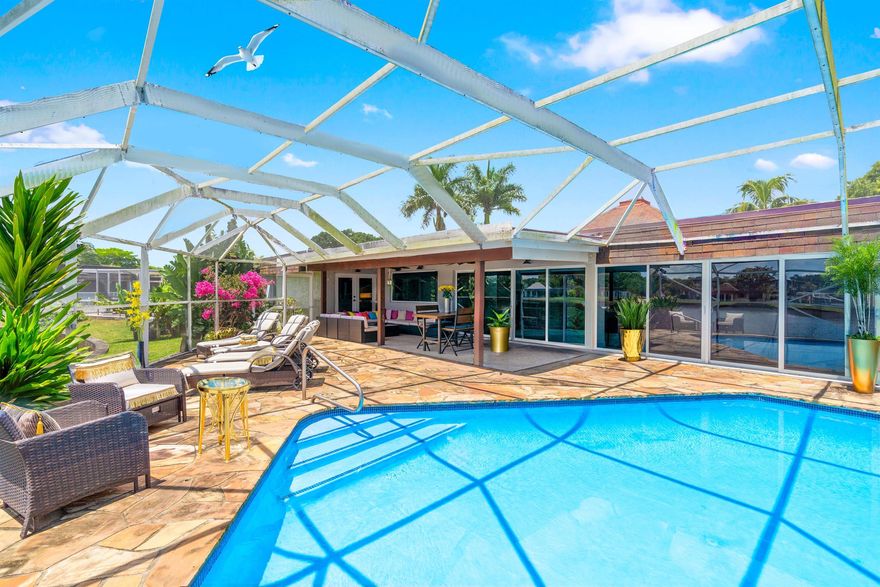 Remodeled to perfection with all the comfort and Luxury you can imagine. Besides beautiful Lake Views and a Private Pool with screened Patio, this Residence offers plenty of Space with 5 Bedrooms, 3 full Bathrooms and a large Volume Ceiling.  Peace of Mind is garanteed by complete impact window protection. The house is powered and cooled by 45 solar panels. ''The Woodlands'' is the most sought after location in Tamarac and properties have sold for over 2 Million Dollars recently. The Clubhouse is being updated including Amenities which adds Value to this amazing Residence. This is a rare opportunity to aquire one of the largest Waterfront Pool Properties still available in this desirable Community. Must watch Walk Through Video !