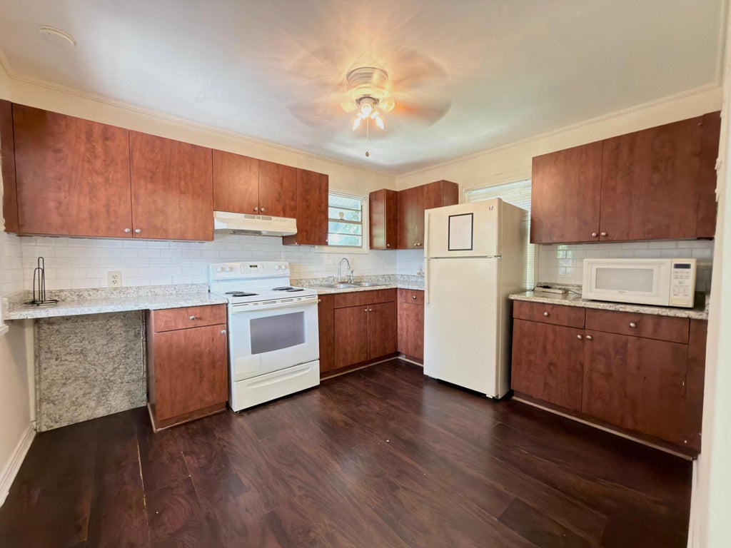 Photo of 710 Tuscaloosa Street #1, West Palm Beach, FL 33405 (MLS # B26076215)