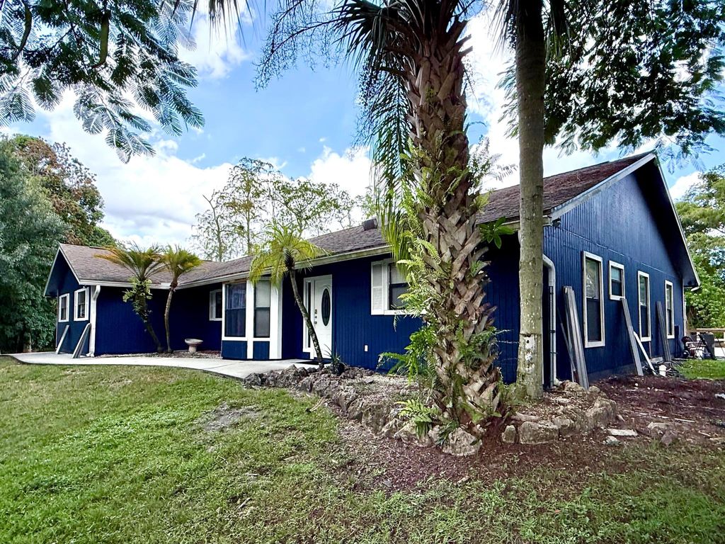 Photo of 15684 86th Way N, Palm Beach Gardens, FL 33418 (MLS # R11117430)