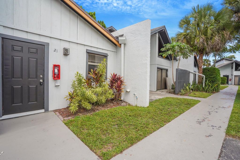 Photo of 100 Sparrow Drive #21, Royal Palm Beach, FL 33411 (MLS # R11134393)