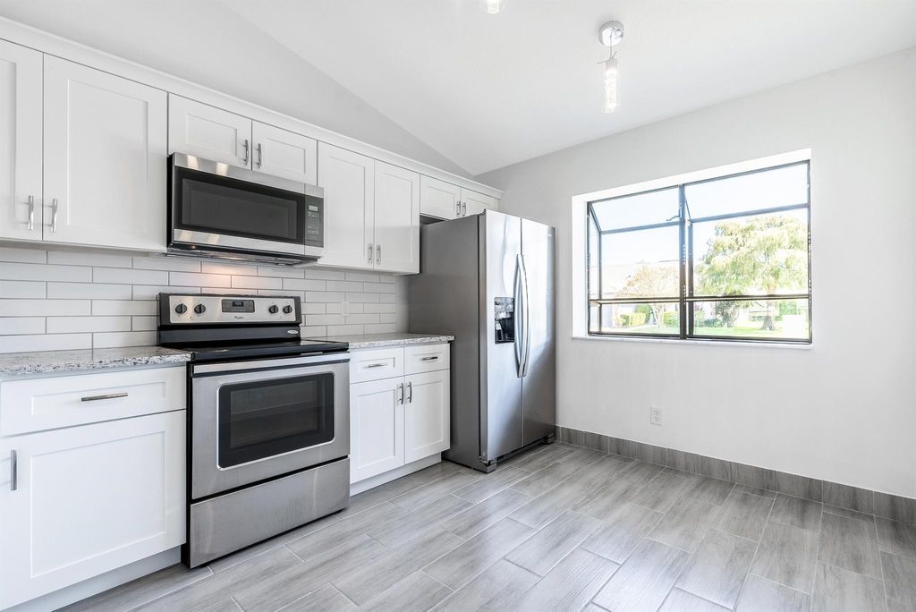 Photo of 140 Moccasin Trail S, Jupiter, FL 33458 (MLS # R10928924)