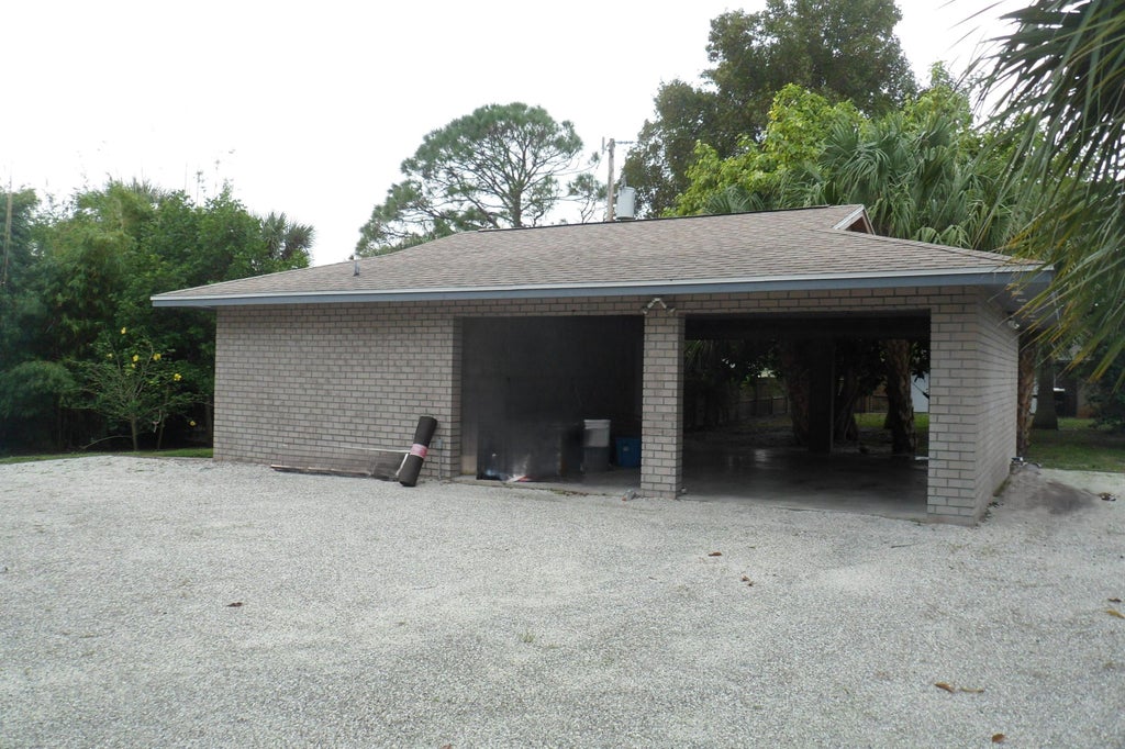 Photo of 2049 SW Cranberry Street, Port Saint Lucie, FL 34953 (MLS # B26080717)