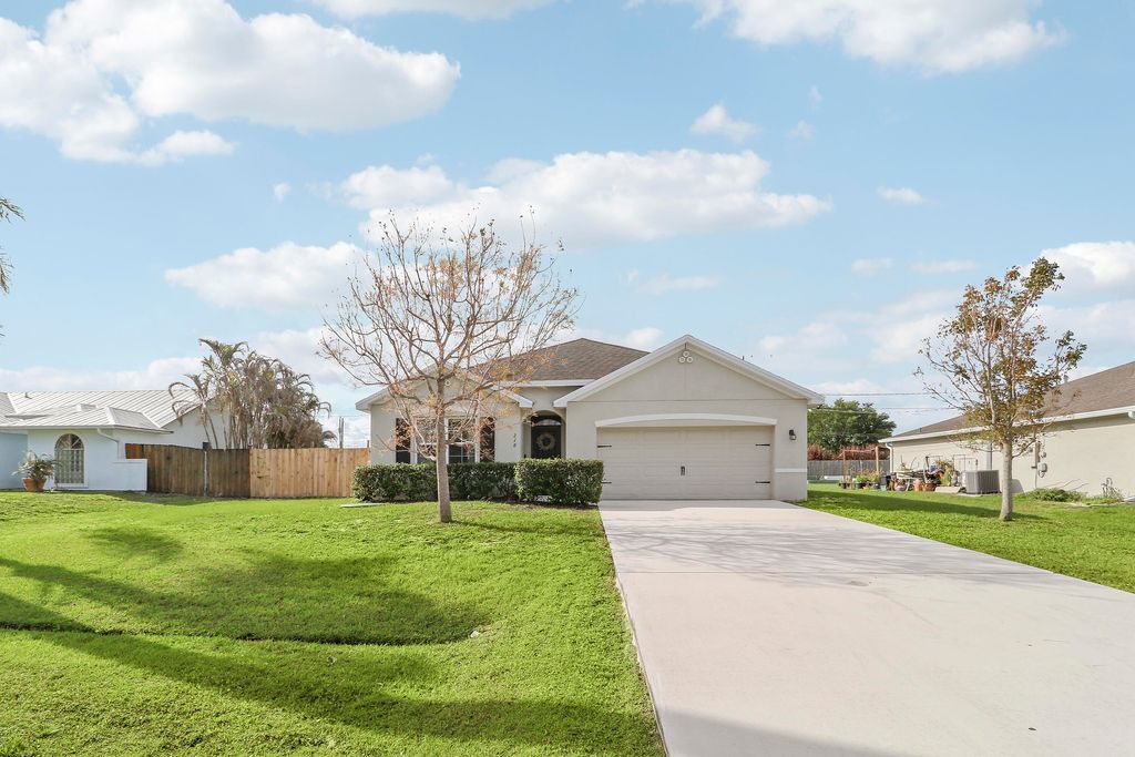 Photo of 218 SW Kestor Drive, Port Saint Lucie, FL 34953 (MLS # B26011036)