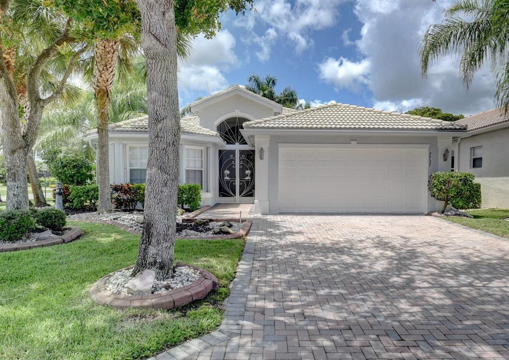 Photo of 7737 Lighthouse Point Lane Ln, Lake Worth Beach, FL 33467 (MLS # R10739786)
