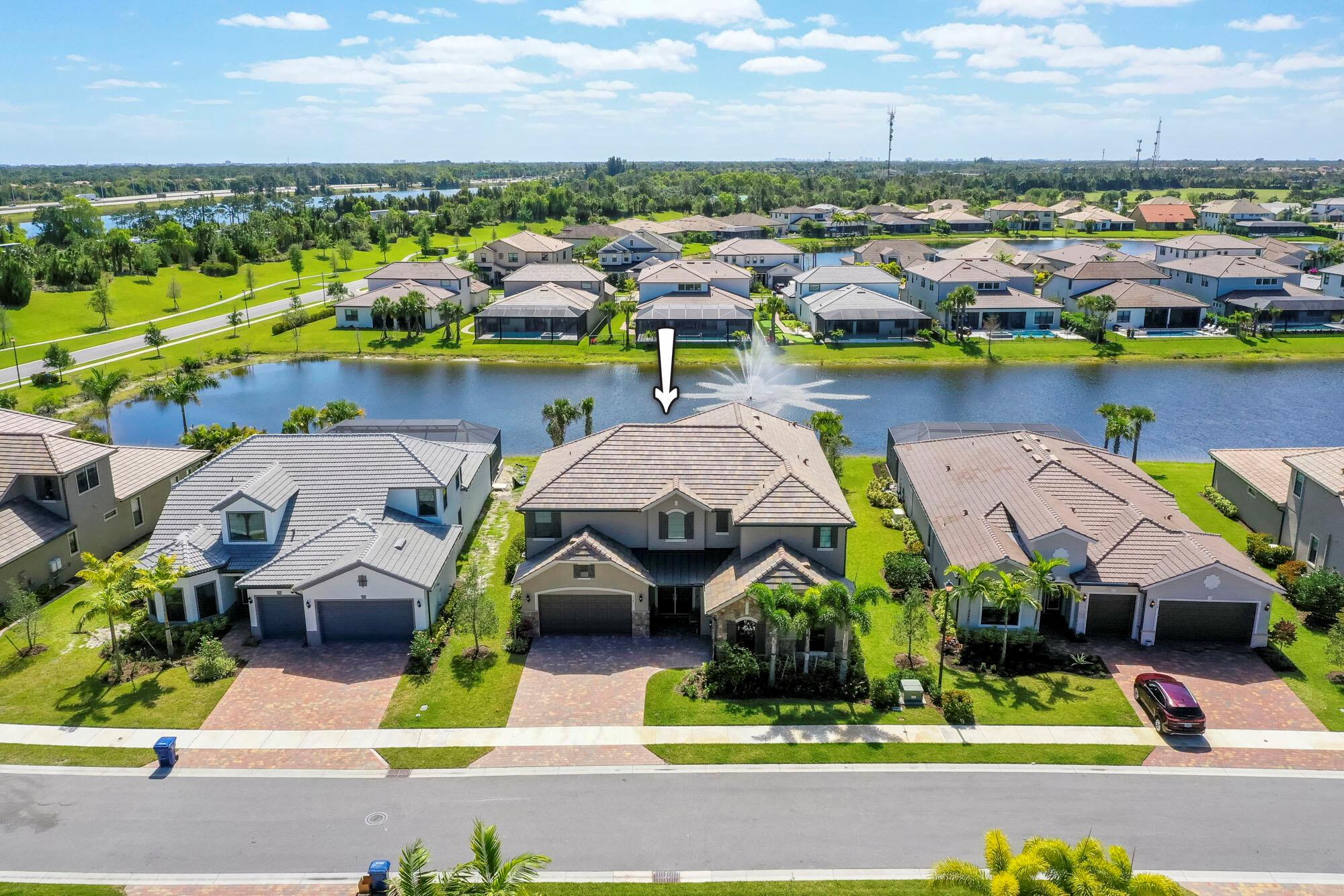 Serene lakefront views are breathtaking from this luxuriously appointed home built in 2021 in the sought after gated community of Sonoma Isles. This gem of a property boasts 5,143 sf of living space, 3 car garage, 5 bedrooms, 6 1/2 baths, an office/den, a loft PLUS a theater room or 6th bedroom is being offered fully furnished/turnkey. Pool & spa are currently being installed with expected completion in August (see rendering photos). Features will include a sunshelf, in-pool stools, waterfall & fire bowls. Countless interior designer upgrades throughout include porcelain tile wood-look flooring & accent walls, upgraded wall trim & crown molding, decorative ceiling planks & beams, and stylish light fixtures & ceiling fans. Loads of smart home connectivity including custom color changing