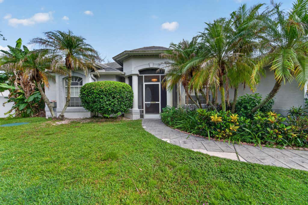 Photo of 5341 NW ALAM Circle, Port Saint Lucie, FL 34986 (MLS # B26060967)