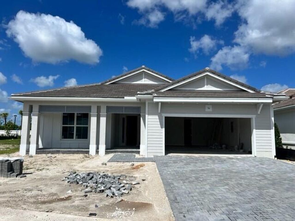 Photo of 9971 Seagrass Way, Palm Beach Gardens, FL 33412 (MLS # R10916642)