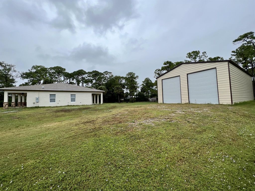 Photo of 12065 62nd Lane N, The Acreage, FL 33412 (MLS # R10937513)
