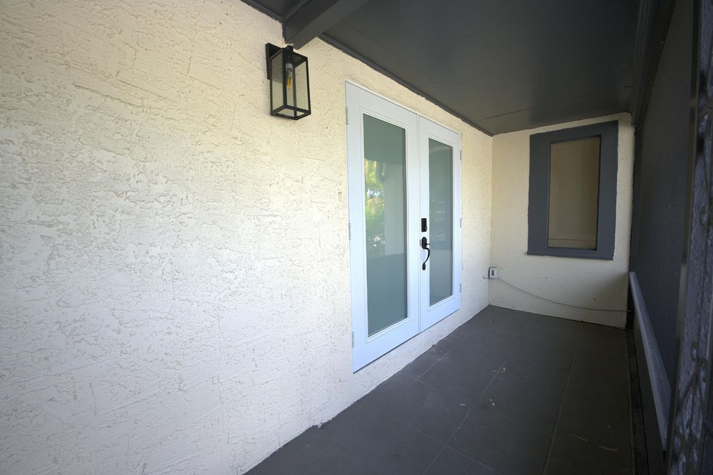 Photo of 717 N E Street, Lake Worth Beach, FL 33460 (MLS # B26015421)