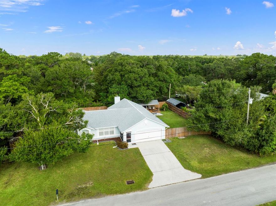 An incredible find in White City! You will feel right at home the moment you walk in to this light and bright home. Very functional floor plan with living and dining rooms separated from the family room with fireplace and split bedrooms. The kitchen open to the family room is an added bonus while entertaining. The privacy fenced yard has ample room with two storage sheds and an open deck for BBQ's.