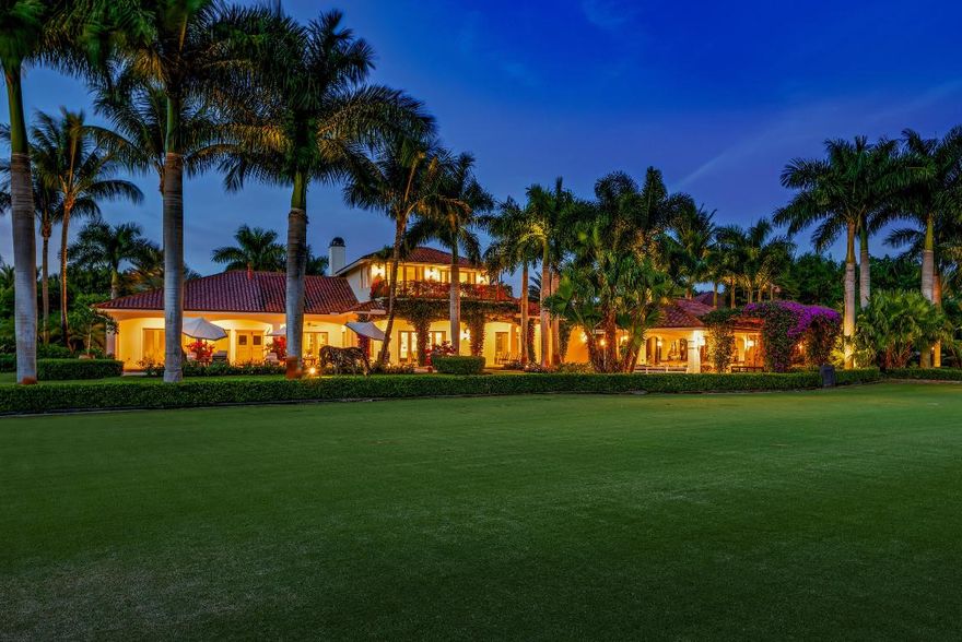 European inspired estate on 4.11 acres in Saddle Trail. Fully renovated in 2015 with no detail overlooked. Main house has 4 bedrooms each with en suite baths and walk in closets. The master features a sitting area with fireplace overlooking the pool area, his and hers walk in closets, marble master bath includes dual water closets with Toto smart toilets, free standing tub and dual head shower. Upstairs has two bedrooms and a private balcony overlooking the grounds. The main living space offers formal living room with fireplace, formal dining room, private office with half bath, open concept kitchen with eat in island, Wolf 6 burner gas range, built in coffee center, and wall ovens. Built in dual Subzero refrigerator and freezer and a dual temperature wine refrigerator. The open kitchen overlooks the grand family room with custom built-ins and views of the entire property. The home features a Lutron Homeworks smart home system with security, generator, LED recessed lighting, volume ceilings with 10ft doors, elevator, wide plank wood and marble floors throughout. French doors from all living spaces lead out to a Chicago Brick patio with outdoor living and dining areas and saltwater pool. An outdoor entertaining gazebo sits adjacent to the rings and patio with comfortable seating area and built in summer kitchen. The two car garage attached to the house has finished floors and built in storage. An additional building encompasses another two car garage, full service gym, and two one bedroom one bathroom apartments. 16 stall barn that features an office, tackroom, feed room, commercial laundry and storage. Additionally there is a 3 bedroom groom's apartment, covered Aquaspa and treadmill areas. To complete the Equestrian features there is a 4 horse Kraft walker, lunging ring, 7 paddocks, an all-weather arena and grass field. The property is masterfully landscaped for the utmost privacy including Bermuda grass lawns, Queen Palm Trees lining Chicago brick walkways and European gravel driveways.