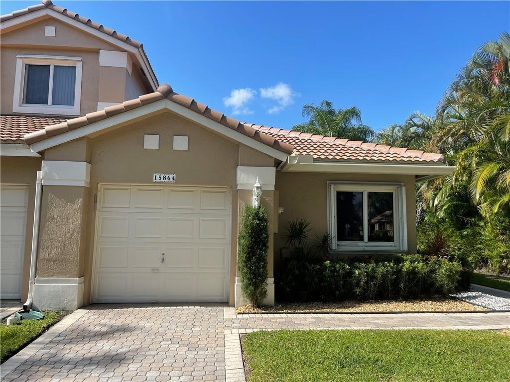 Welcome to your ideal home! Nestled in a serene corner, this charming 3-bedroom, 2-bathroom villa boasts a one-car garage and is conveniently situated next to the community pool. Enjoy resort-style living with additional access to a fitness center and another lavish pool within the community. Indulge in the tastefully updated kitchen and baths featuring elegant granite countertops. Perfect for all ages, this community offers a plethora of amenities. Step onto the inviting screened patio overlooking a spacious grassy area exclusively for your unit's enjoyment. Don't miss out on this exceptional opportunity to call this place your own!