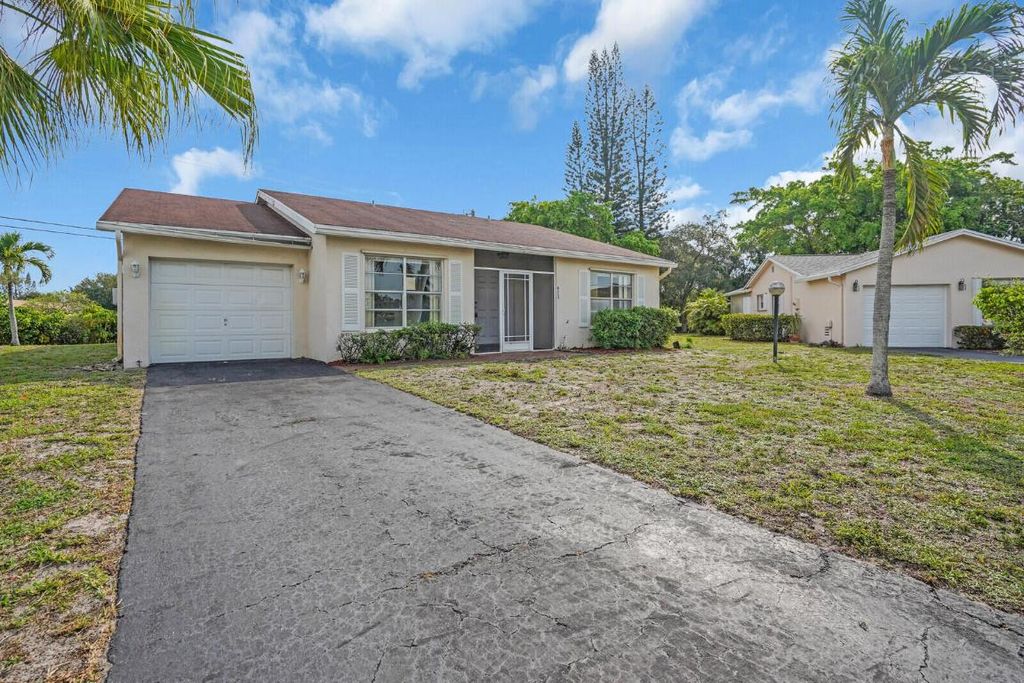 Photo of 6113 Rainbow Circle, Greenacres, FL 33463 (MLS # R11096608)