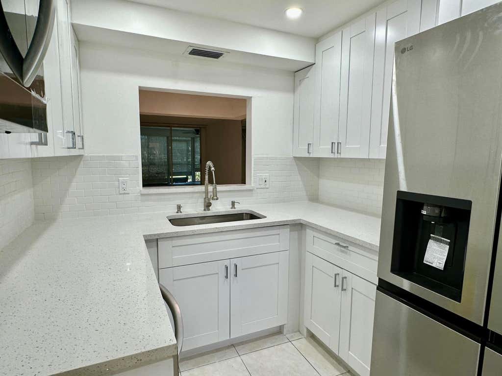 Photo of 23099 BARWOOD Lane N #109, Boca Raton, FL 33428 (MLS # B26063608)