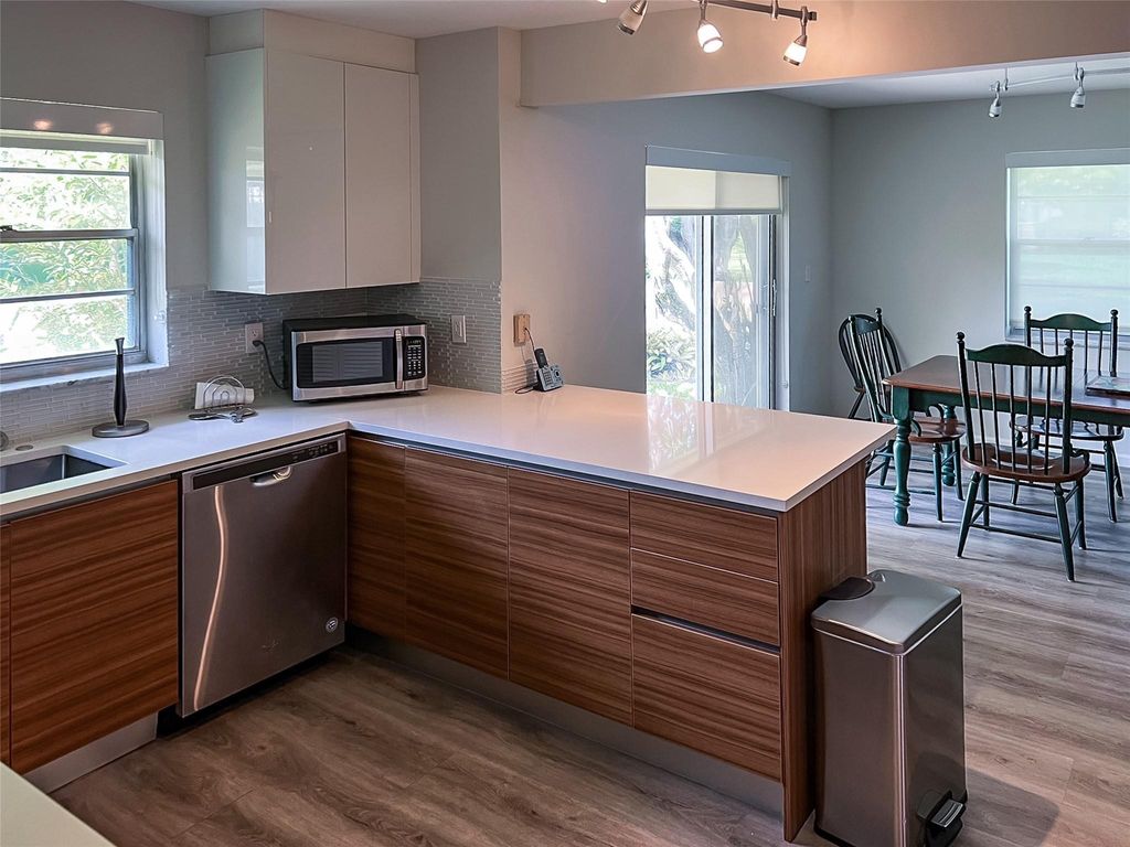 Photo of 3651 Oaks Clubhouse Drive #3651, Pompano Beach, FL 33069 (MLS # F10423367)