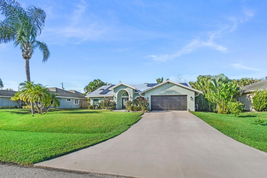 Photo of 475 SE Nome Drive, Port Saint Lucie, FL 34984 (MLS # R11135147)