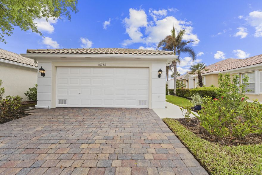 Welcome home to this beautifully maintained POURED CONCRETE Divosta built Capri model in Lakes of Tradition. This set up is ideal for two primary bedroom suites and open floorplan. Enjoy a wonderful view of the private preserve from you screened in patio. Lakes of Tradition is centrally located near Tradition Square and all that it has to offer. Walk or hop on your bike for a quick venture to the restaurants! The home has recently been painted outside and boasts a fresh curb appeal.  Located down the street from the clubhouse which offers 2 pools, a fitness center, pickle ball, bocci ball, shuffle board, card room, library and kitchen. The HOA covers lawn care, clubhouse, manned gate, common areas, cable, internet, security. Near I95 North and South for a quick commute. This has it all!