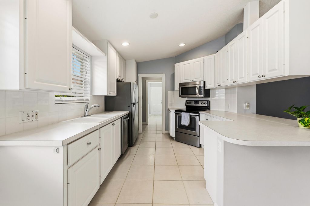 Photo of 10762 SW Elsinore Drive, Port Saint Lucie, FL 34987 (MLS # B26013130)