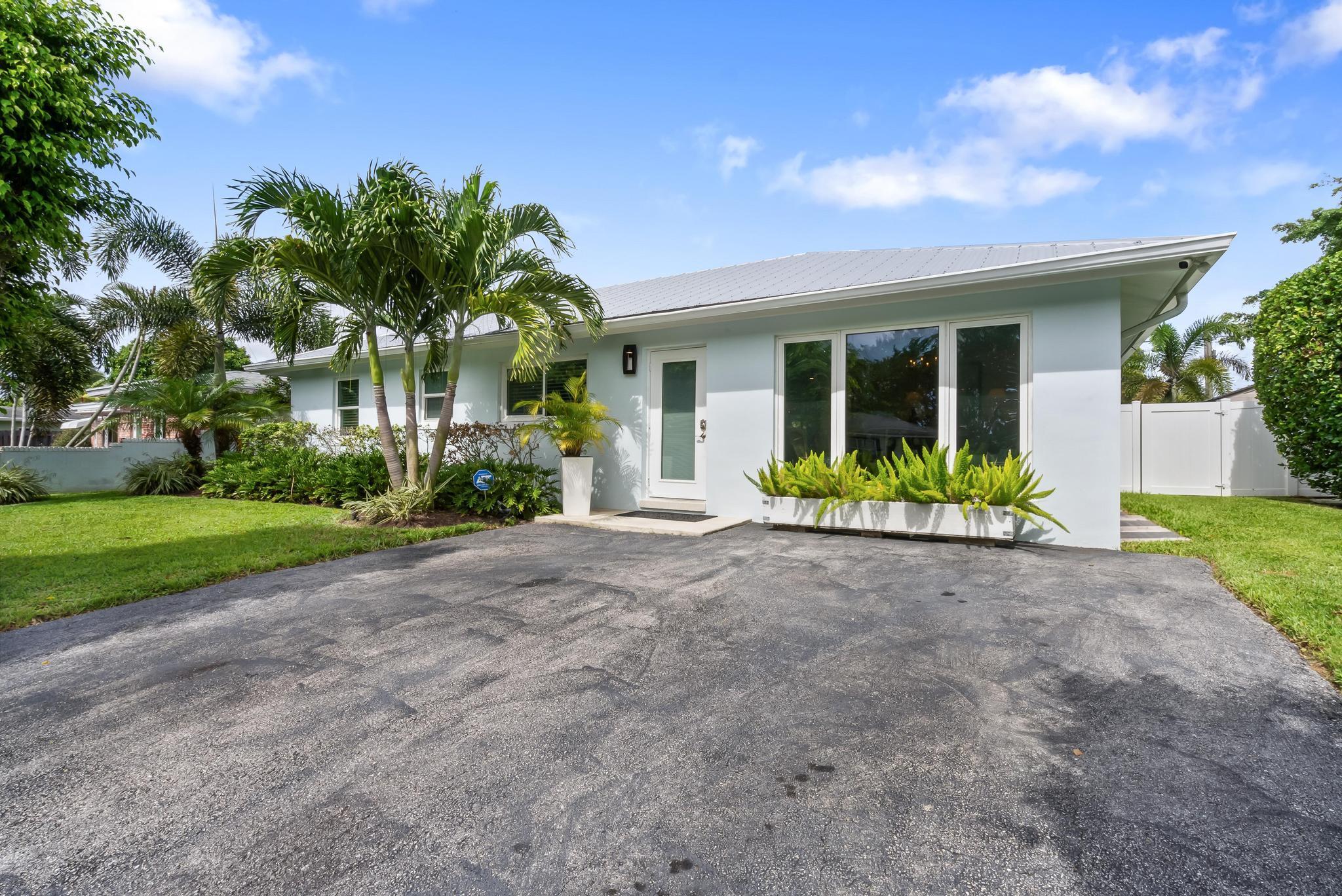 Experience elevated South Florida living in this elegant 3-bedroom, 3-bath pool home, positioned on a corner lot in one of East Delray's most coveted enclaves, minutes from the boutiques, dining, and nightlife of Atlantic Avenue.The 2024 chef's kitchen is a true showpiece, with a Fulgor Milano induction cooktop & grill, matching designer hood, & full suite of Thor appliances including a built-in wine fridge & drawer microwave.Natural light, refined finishes, & a seamless indoor-outdoor flow creates a home as perfect for quiet moments as it is for elegant entertaining. Step outside to your private retreat with a sparkling pool, mature landscaping, and ample space to lounge, dine, or unwindThis is East Delray luxury redefined where timeless design meets effortless coastal living