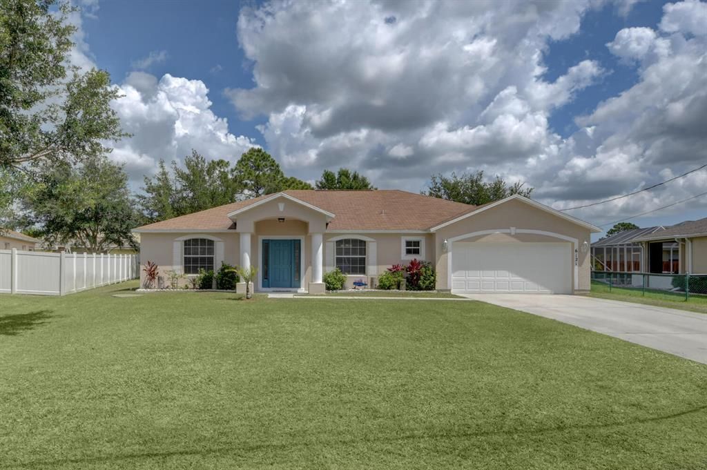 Photo of 6121 NW Drophy Avenue Ave, Port St Lucie, FL 34986 (MLS # R10715941)