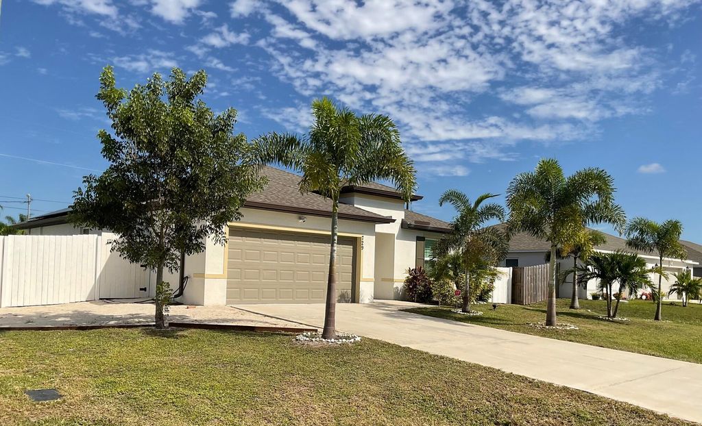 Photo of 729 SW Haas Avenue, Port Saint Lucie, FL 34953 (MLS # R11139769)