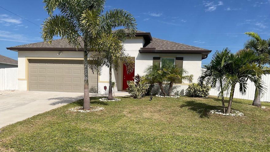 Don't miss out on one of the best values in South Florida! This luxurious, exceptionally maintained, practically NEW 4BR home total is 2324 Sqft, is available due to the owner's job relocation and showcases over $150,000 in recent upgrades. Enjoy a gourmet kitchen with granite countertops, stainless steel appliances, and a smart home system. Security system with cameras included. $55K solar panels reduce power bills to about $28/month. Outdoor oasis features a $30K new 456 sq. ft. Travertine patio and $28K in lush landscaping with mature palms, sprinkler, and irrigation. Peace of mind Impact windows, $10K new plantation shutters, $15K custom paint, new fence, shed, and new washer/dryer complete this move-in-ready gem.  With its premium features this home won't last long.