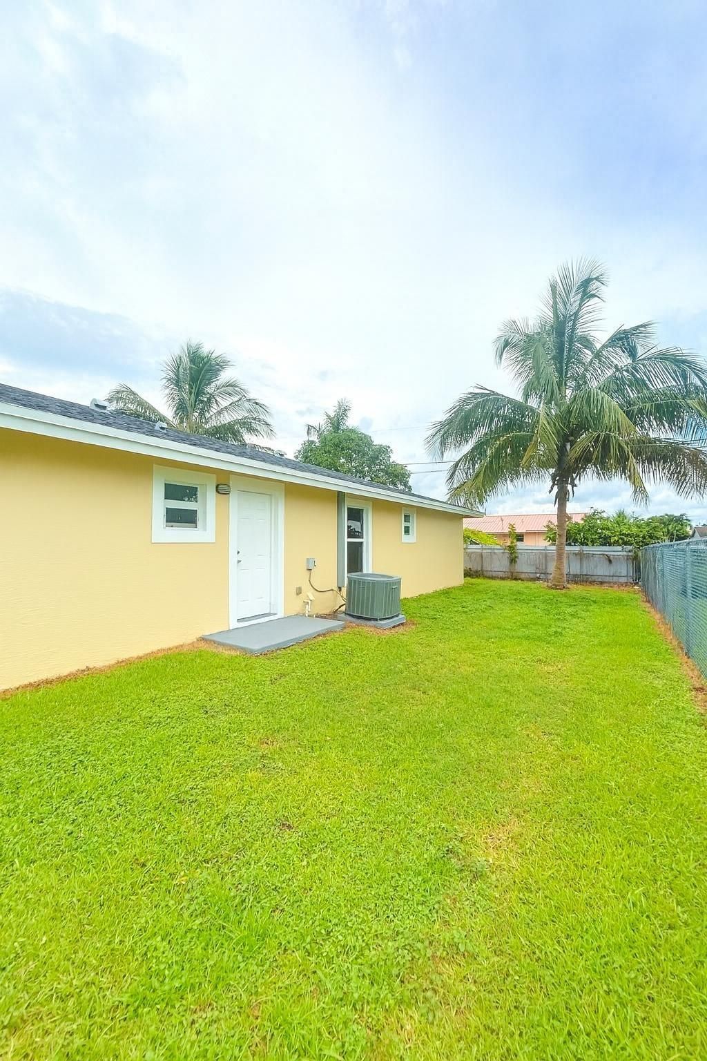 Photo of 1101 Ave J, Belle Glade, FL 33430 (MLS # F10522757)
