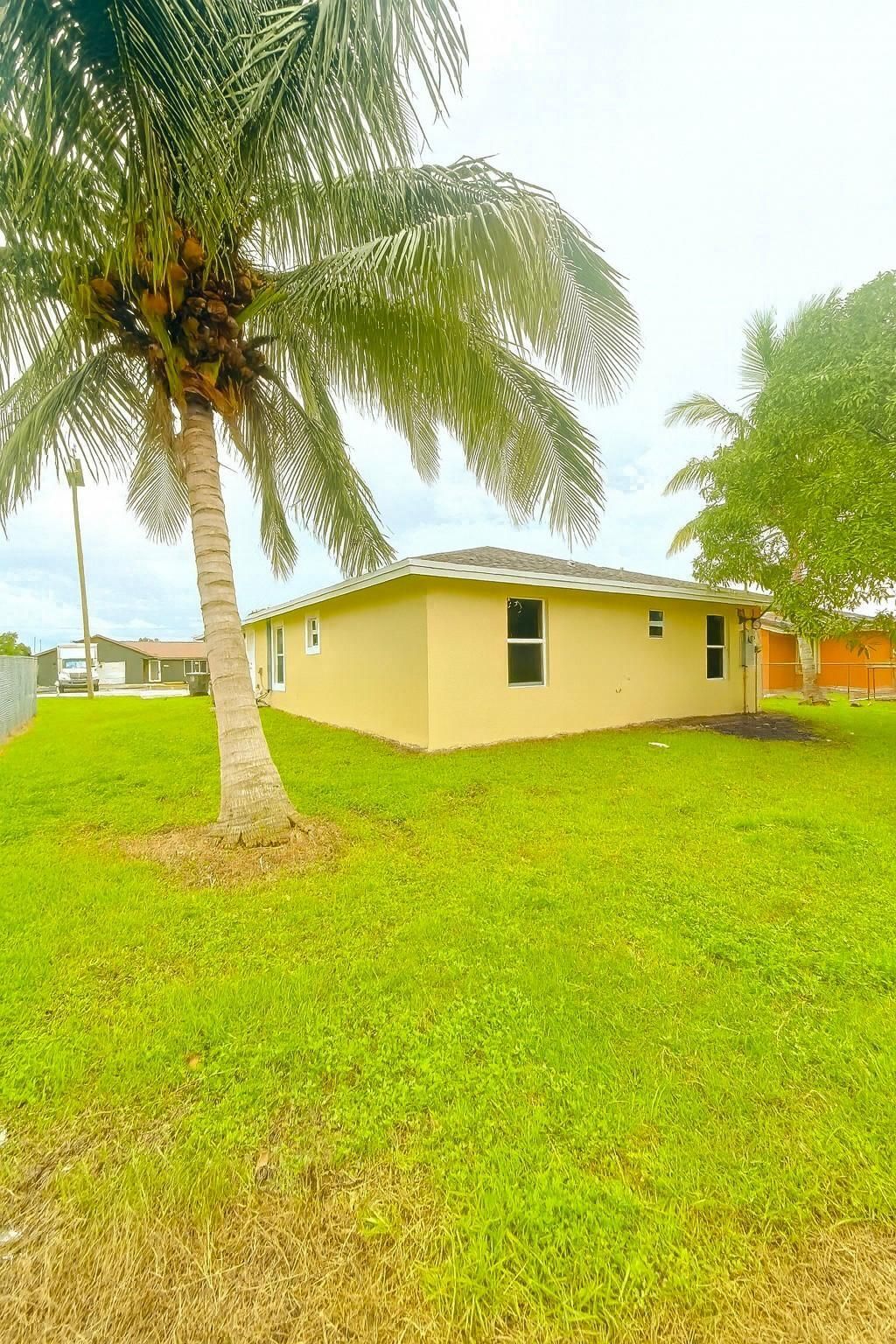 Photo of 1101 Ave J, Belle Glade, FL 33430 (MLS # F10522757)