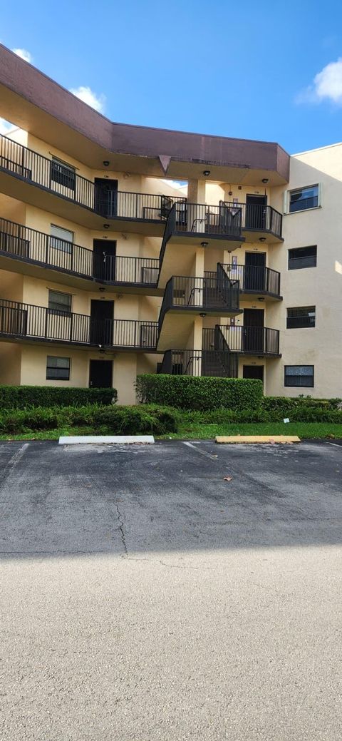 Photo of 6555 W Broward Boulevard #201, Plantation, FL 33317 (MLS # R11169436)