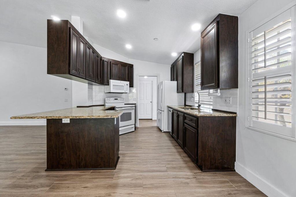 Photo of 4051 Grove Point Road, Palm Beach Gardens, FL 33410 (MLS # R11057502)