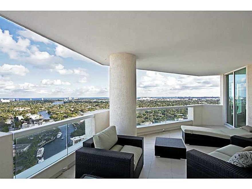 Surrounded by windows adore the most amazing 26 floor views from this corner unit down the New River, Las Olas and expansive ocean. Enter the grand foyer ideal for an impressive art collection and your eyes immediately capture views from every room in the  residence. Features large private terraces & many upgrades including state of the art kitchen with Pogenpohl cabinetry, wood floors, custom glass doors,& Armadi Closets. Las Olas Grand 5 star amenities include valet, front guard, concierge and more.