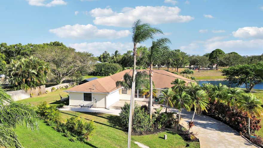 LOCATION, LOCATION, LOCATION! Close to the beach, nestled on a 1/3 acre cul-de-sac lot with incredible canal views with NO HOA! Don't miss this 3BR/2.5BA/2CG home in eastern PSL! Great location with easy access to shopping, Jensen Beach, Stuart, schools, US-1 and more. Special features include wood-look tile throughout the house, a huge screened patio with canal views from every direction, tropical landscaping, updated kitchen and baths, room for a pool, well irrigation (with new well pump), extended driveway, numerous pocketing slider doors to the patio and more! The master suite has dual walk-in closets, access to the patio as well as ensuite with updated vanity and a separate shower. Two guest bedrooms share a hall bath. Laundry room doubles as a powder bath when needed.
