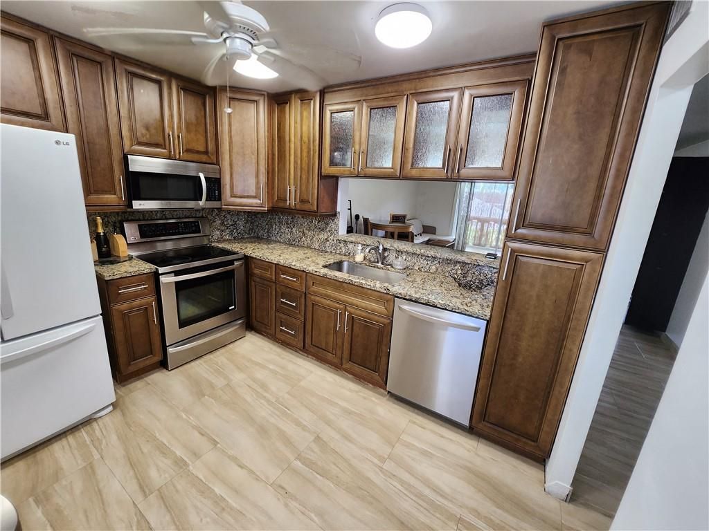 Photo of 219 NE 14th Ave #202, Hallandale Beach, FL 33009 (MLS # F10389023)