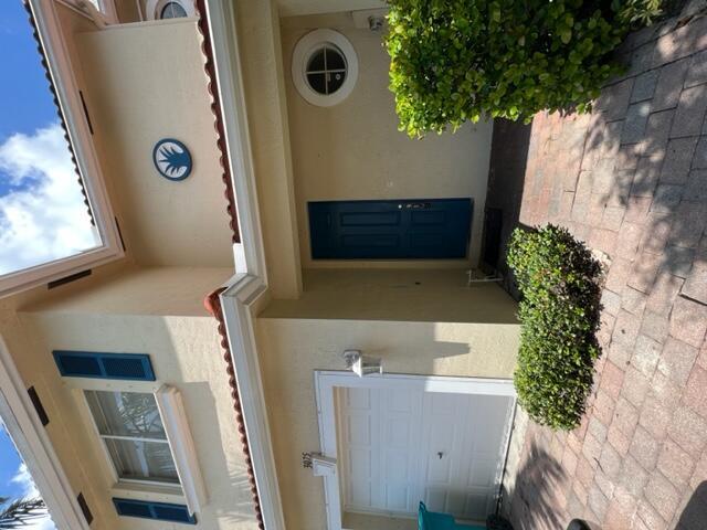 Spacious 2 story townhome, stone tiled living area, crown molding throughout 1st floor. Kitchen features raised panel cherry cabinets, granite countertops and island.