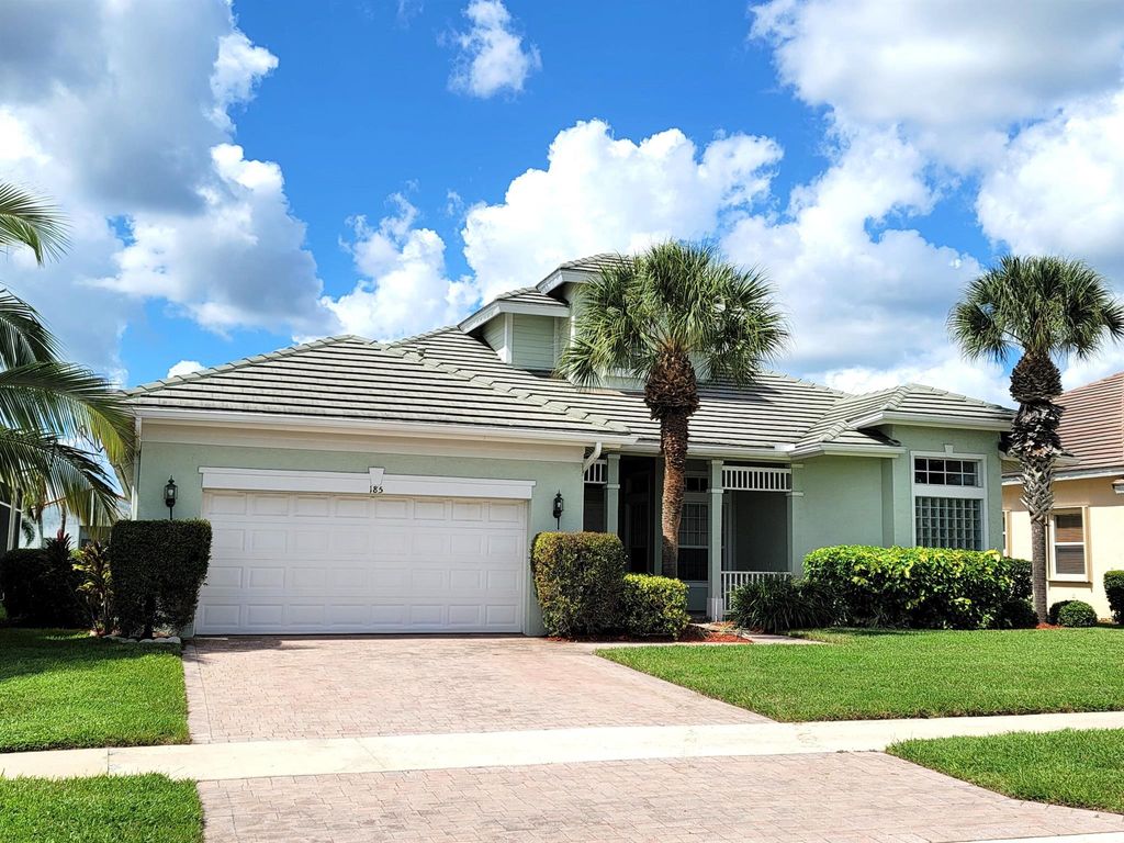 Photo of 185 NW Magnolia Lakes Boulevard, Port Saint Lucie, FL 34986 (MLS # R11058423)