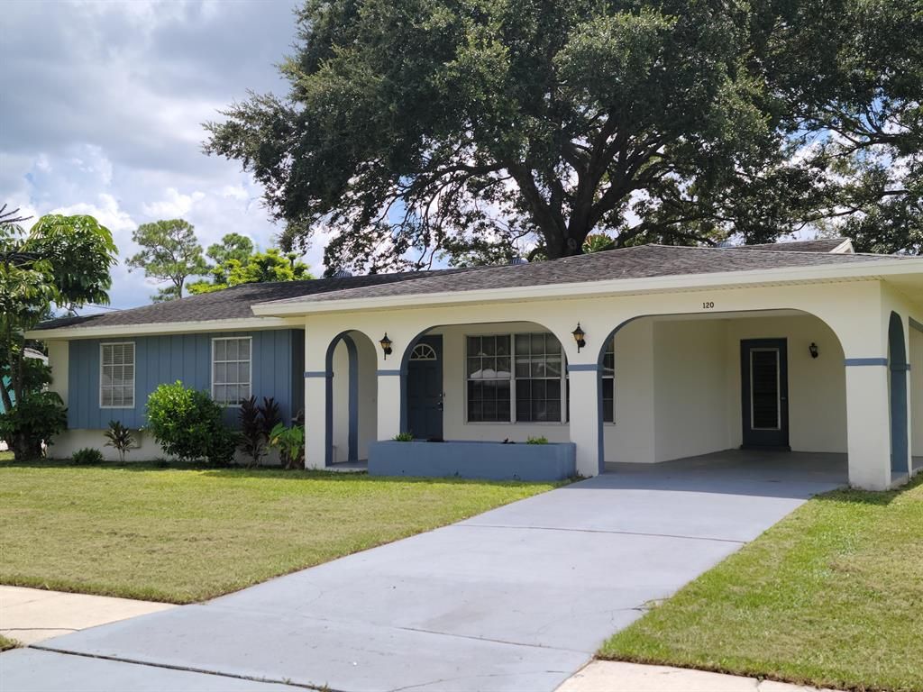 Photo of 120 S Naranja Avenue, Port Saint Lucie, FL 34983 (MLS # R10745078)